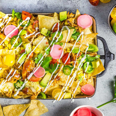 Summer Nachos With Tomatoes, Corn, Chicken, and Cheese